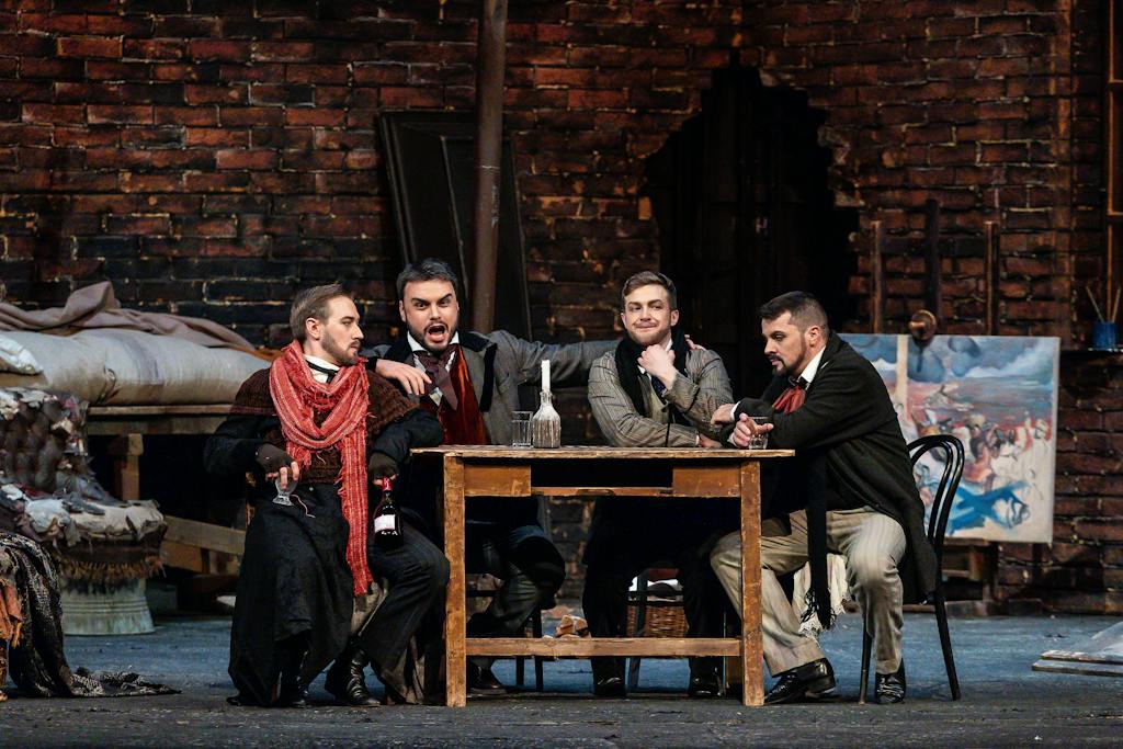 Opera I La bohéme: Jan Hnyk (Colline), Lukáš Bařák (Schaunard), Petr Nekoranec (Rodolfo), Jiří Brückler (Marcello) – photo: Zdeněk Sokol